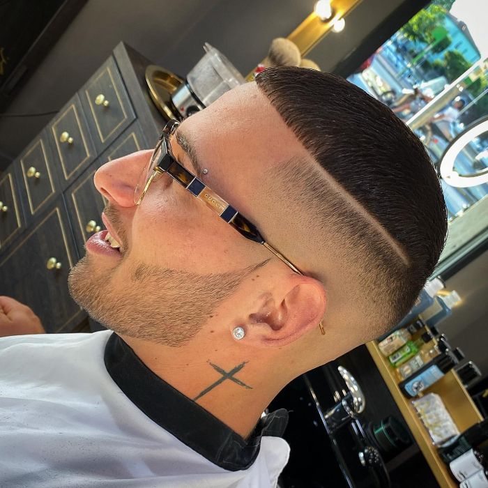 Slicked Hard Side Part with High Fade