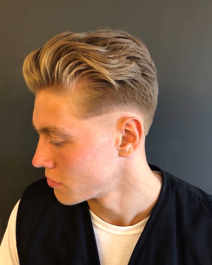 Low Skin Fade + Short Wavy Slick Back