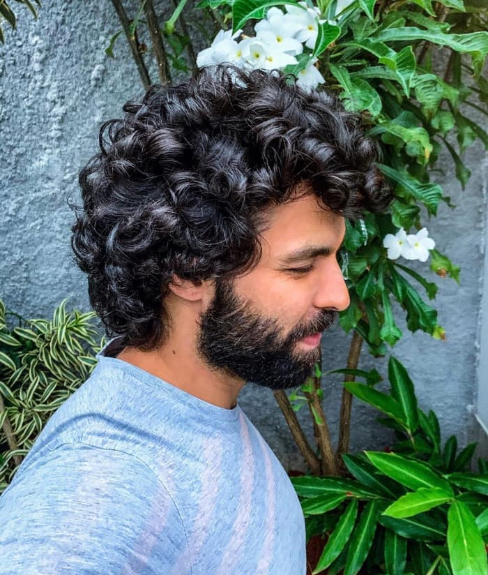 Intense Curls with Subtle Widow's Peak