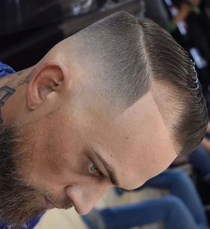 Round Face Shape Bald Fade with Slick Back