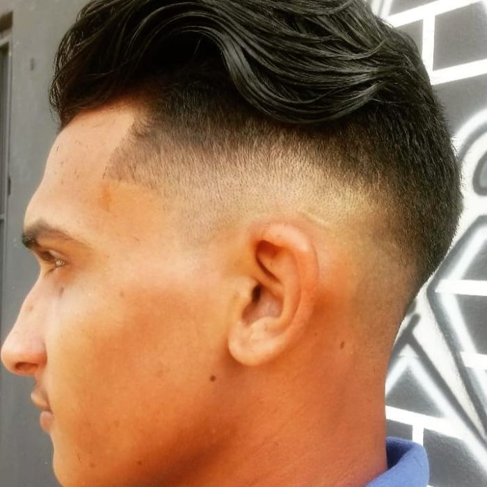 Wavy Brushed Back Hair + Low Skin Fade