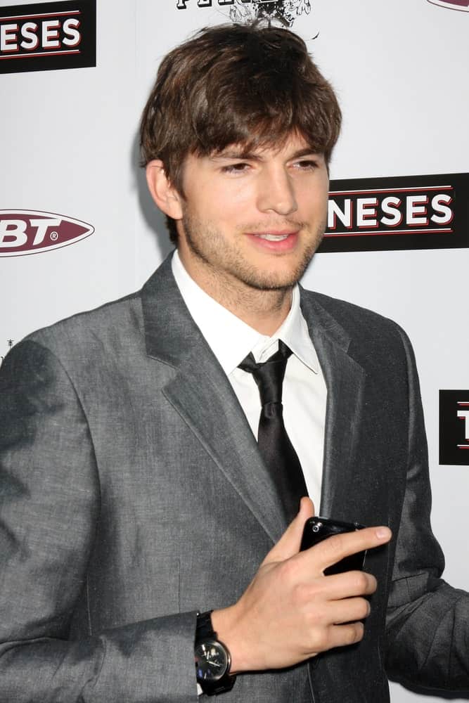 Ashton Kutcher's trimmed beard was a perfect match for his highlighted and tousled fringe hairstyle at the premiere of 'The Joneses' at the ArcLight Theater in Los Angeles, California on April 7, 2010.