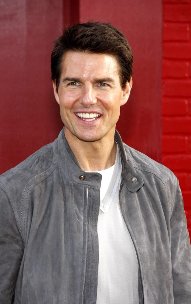 Last June 8, 2012, Tom Cruise attended the Los Angeles premiere of "Rock of Ages" held at the Grauman's Chinese Theater in Los Angeles. He wore a casual jacket and shirt outfit with a short, side-parted hairstyle with highlights.