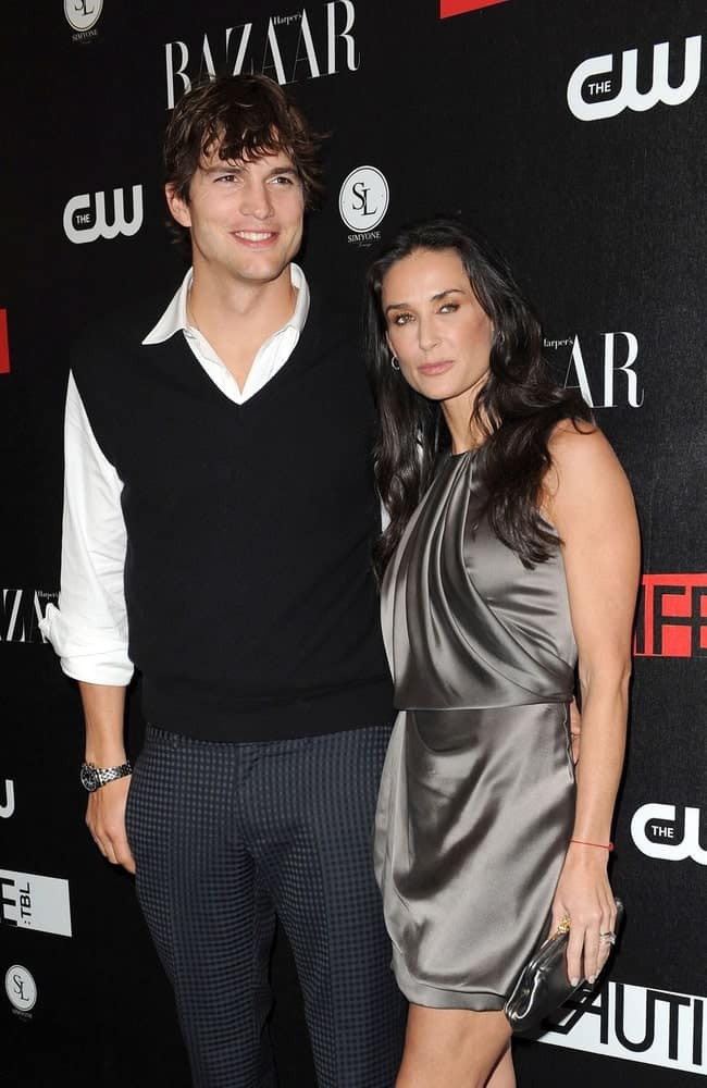 Ashton Kutcher and Demi Moore were at The Beautiful Life premiere party in the Simyone Lounge, New York on September 12, 2009. Kutcher's fashion forward smart casual outfit is a nice complement to his iconic wavy fringe hair.