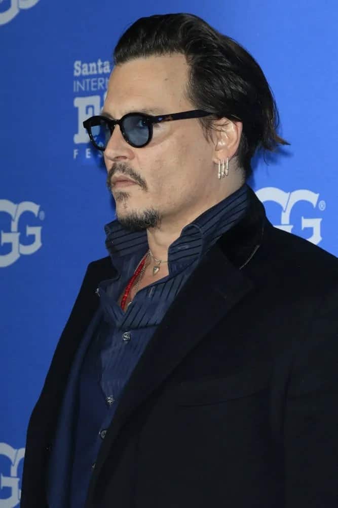 Johnny Depp showcased his long brushed up hairstyle and a wonderful outfit at the 31st Santa Barbara International Film Festival - Maitlin Modern Master Award at the Arlington Theatre last February 4, 2016 in Santa Barbara, CA.