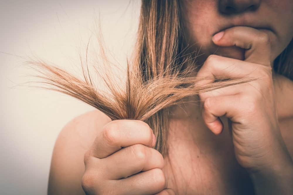 A woman with brittle hair