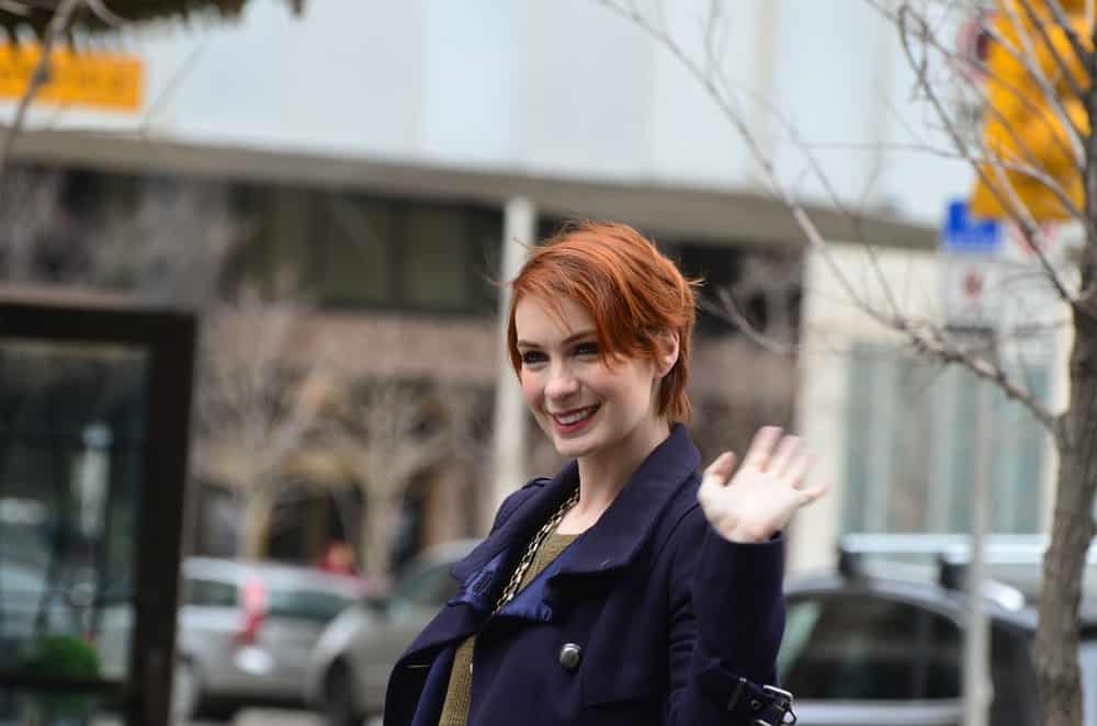 Comic and Entertainment Expo Parade Actress Felicia Day from Supernatural rides in parade proceeding Calgary Comic Expo.