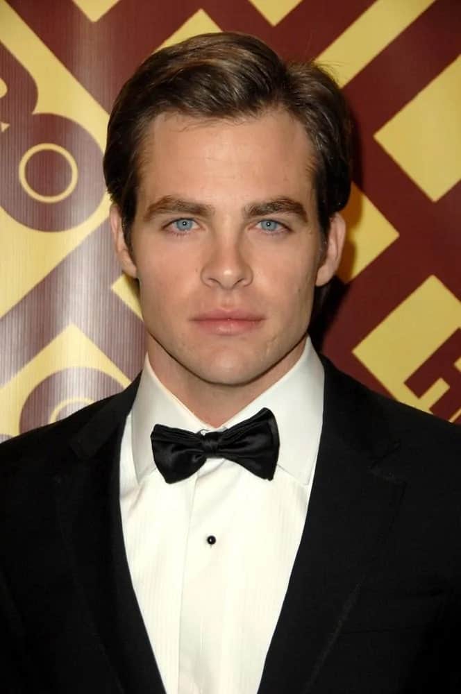 Chris Pine's handsome features are at full display with this neat and short side-parted slick hairstyle and classy black tux during the 2009 HBO Golden Globe Awards After Party in Beverly Hills, CA.