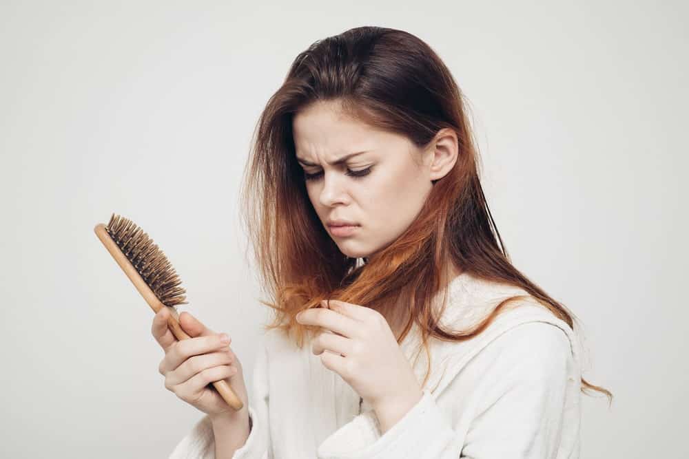 A Perplexed Girl with Hair Problems