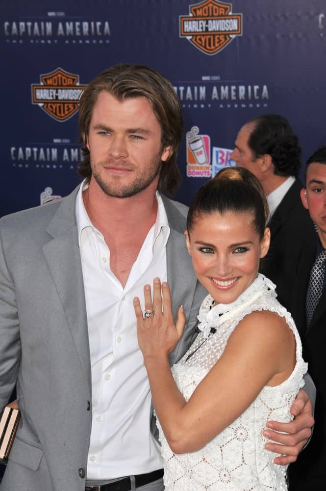 Chris Hemsworth & wife Elsa Pataky were at the premiere of "Captain America: The First Avenger" at the El Capitan Theatre, Hollywood last July 19, 2011 in Los Angeles. The couple were matching in white outfits that complements their long dark hair with highlights.