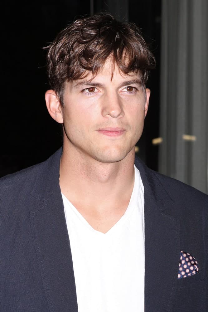 Ashton Kutcher wore a smart casual outfit with his short tousled fringe when he attended the screening of "Jobs" at the Museum of Modern Art on August 7, 2013 in New York City.