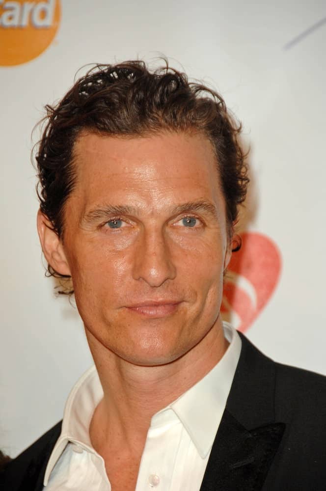 Matthew McConaughey had short dark curls with dark brown highlights when he attended the 2010 MusiCares Person Of The Year Tribute To Neil Young, Los Angeles Convention Center.