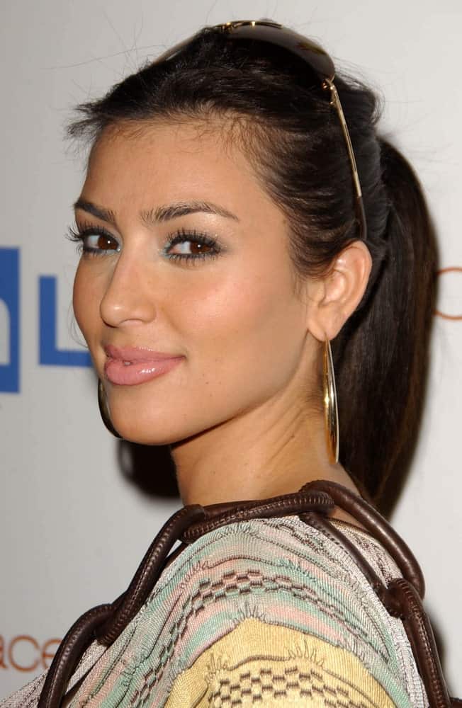 On June 21, 2007, Kim Kardashian went for a high ponytail incorporated with shades as she attends the OmniPeace Benefit To Stop Extreme Poverty in Sub-Saharan Africa.