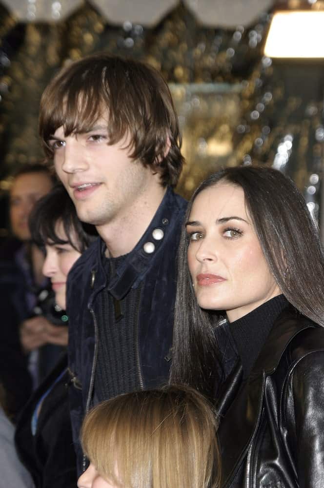 Ashton Kutcher's long and layered fringe was paired with a black casual outfit at the "Cheaper by the Dozen" World Premiere at the Chinese Theatre on December 13, 2003.