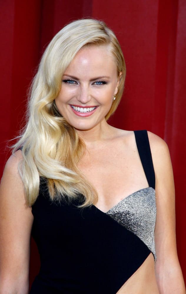 Malin Akerman's sexy black and silver dress was paired with a side-parted wavy hairstyle with highlights at the Los Angeles premiere of 'Rock of Ages' held at the Grauman's Chinese Theatre last June 8, 2012.