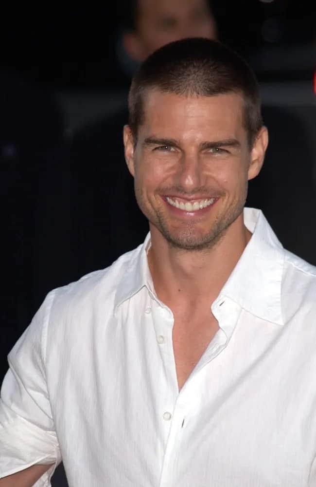 Tom Cruise wore a buzz cut hairstyle with his white button-down shirt at the Los Angeles premiere of "The Others" back in 2001 which he produced starring his former wife Nicole Kidman.