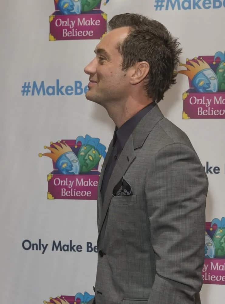 Jude Law sported an unkempt tousled dark brown hair at the Only Make Believe 2016 Gala MAKE BELIEVE ON BROADWAY as an honoree at St. James Theater in New York.