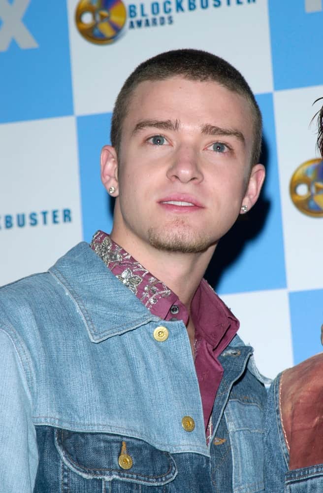 Justin Timberlake sporting a buzz haircut and a denim jacket at the 2001 Blockbuster Awards in Los Angeles, California.