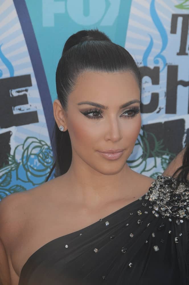 Kim Kardashian slicked back her hair into a high ponytail at the 2010 Teen Choice Awards - Arrivals, Gibson Amphitheater, Universal City, on August 8, 2010.