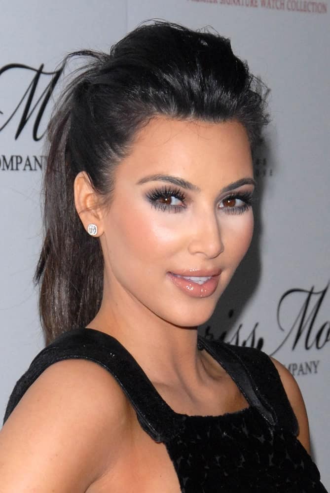 Kim Kardashian rocking a tousled pompadour ponytail at the launch of the Kim Kardashian Brissmor Signature Watch Collection on December 7, 2010, in Whisper Lounge, Los Angeles.