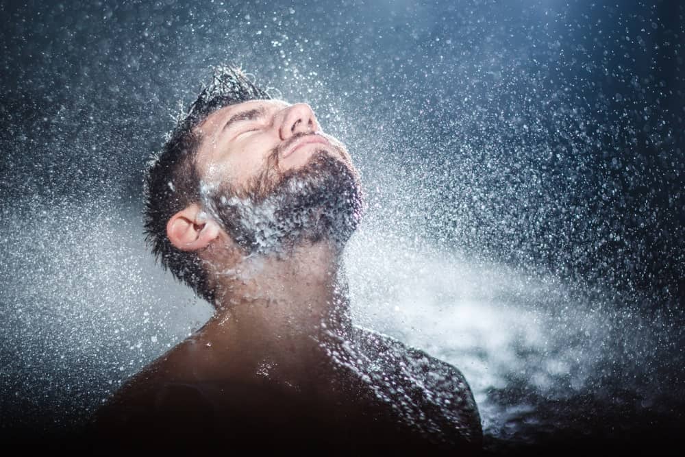 Man taking a shower.