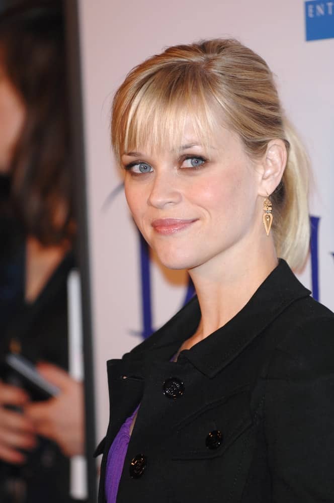 Reese Witherspoon attended the Los Angeles premiere of her new movie "Penelope" at the Directors Guild Theatre, West Hollywood on February 20, 2008 in Los Angeles, CA. She was simple yet lovely with her neat blond ponytail incorporated with blunt bangs.