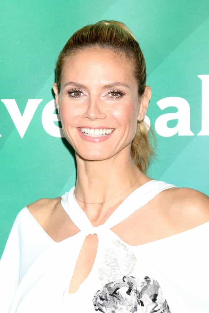 The actress in a wavy ponytail, flashing a captivating smile during the NBC Universal Summer Press Day 2016.