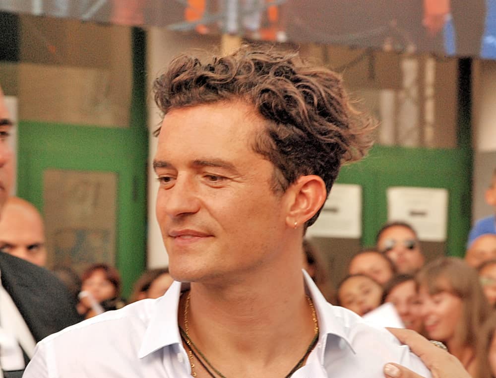 Actor Orlando Bloom's curly hair was styled into this wind-swept undercut look at the 2015 Giffoni Film Festival in Giffoni Valle Piana, Italy.