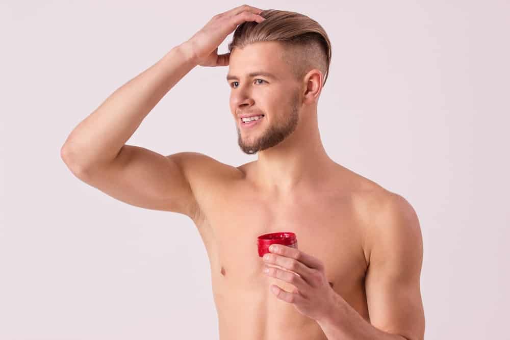 Man styling his hair.