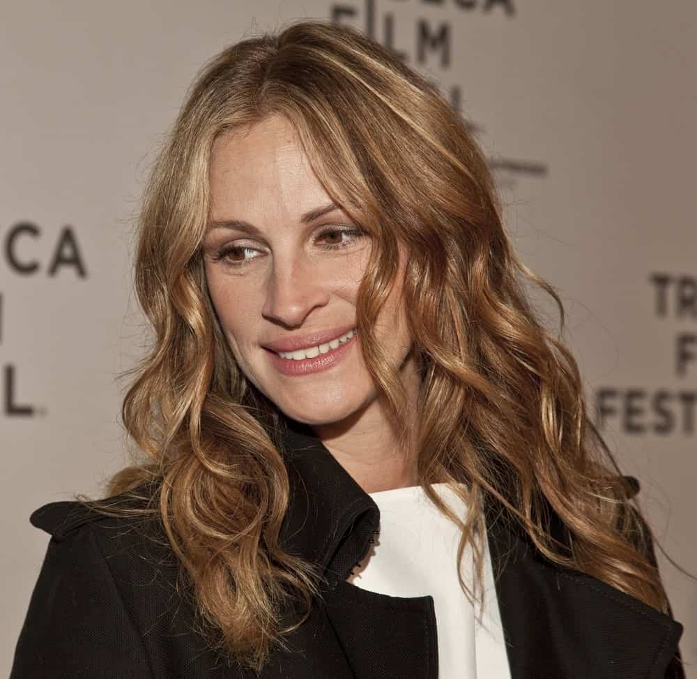 On April 23, 2011, the actress arrived for the premiere of "Jesus Henry Christ" at the 2011 Tribeca Film Festival with soft highlighted curls paired with a black coat.