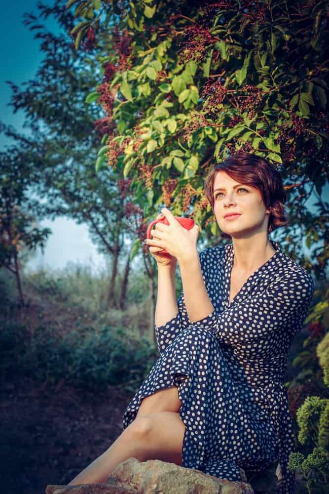 Woman with Curly Brown Pixie Hair