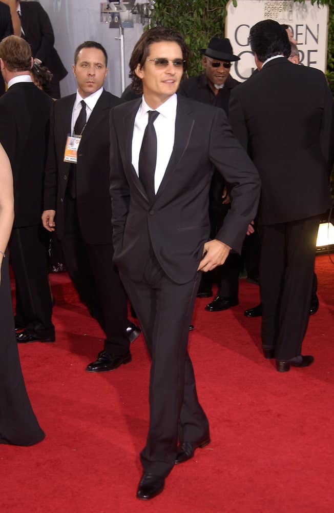 On January 16, 2005, Actor Orlando Bloom was at the 62nd Annual Golden Globe Awards at the Beverly Hilton Hotel. He was dapper in his classy black suit and long slick hair with slight curls at the tips.