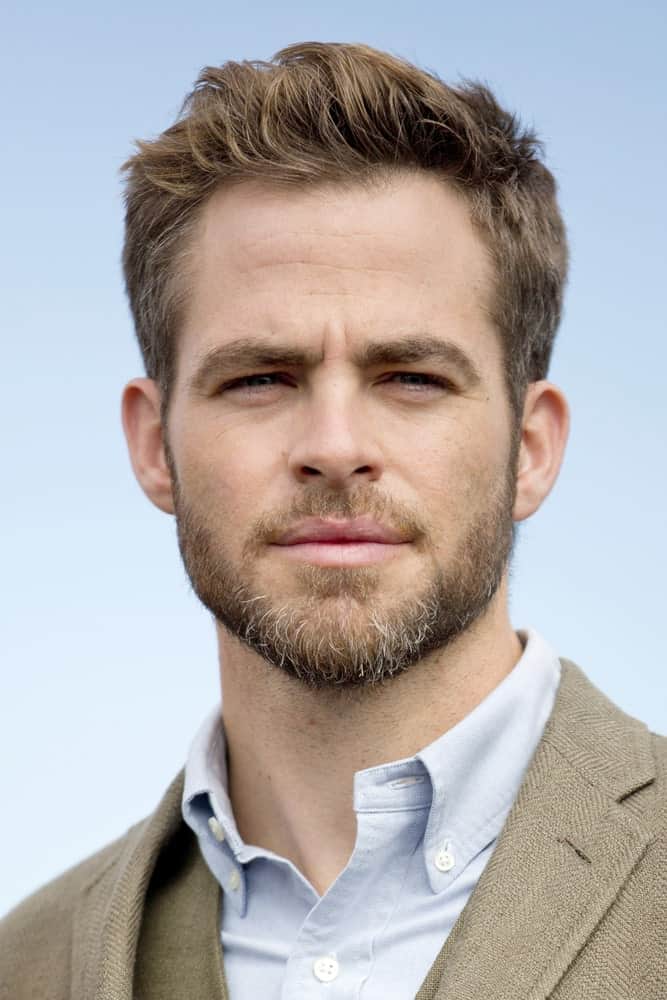 Chris Pine attended the Star Trek - Into Darkness Photo Call last April 28, 2013 in Berlin, Germany with his light tan three-piece suit that he paired with his gorgeous highlighted and tousled hair and trimmed beard.