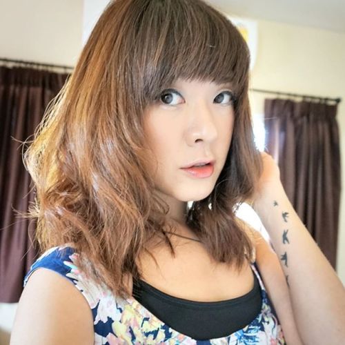 Medium Asian Bob Hairstyle with bangs for Asian girls