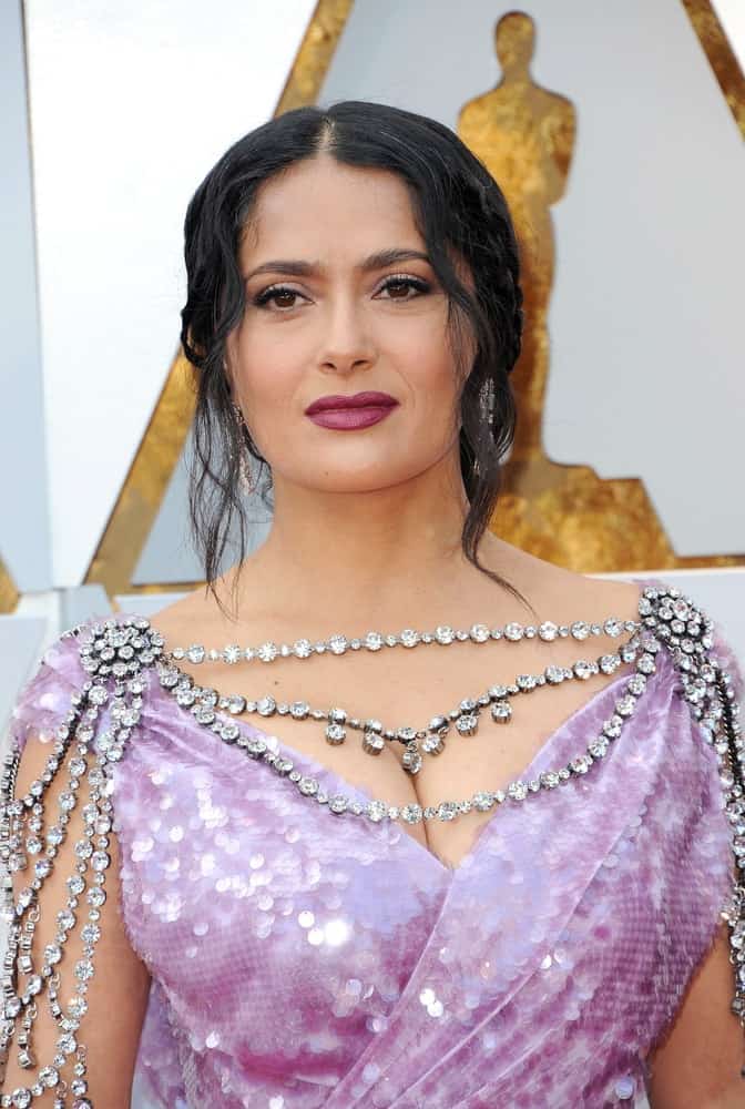 Salma Hayek was at the 90th Annual Academy Awards held at the Dolby Theatre in Hollywood last March 4, 2018. She was a vision of beauty in her shiny jeweled dress complemented by a messy upstyle with braids and tendrils.