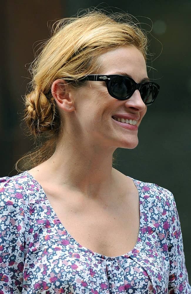 The actress on location for EAT LOVE PRAY filming in Lower Manhattan, New York on August 20, 2009. She wore a tousled low twisted bun paired with black shades. 