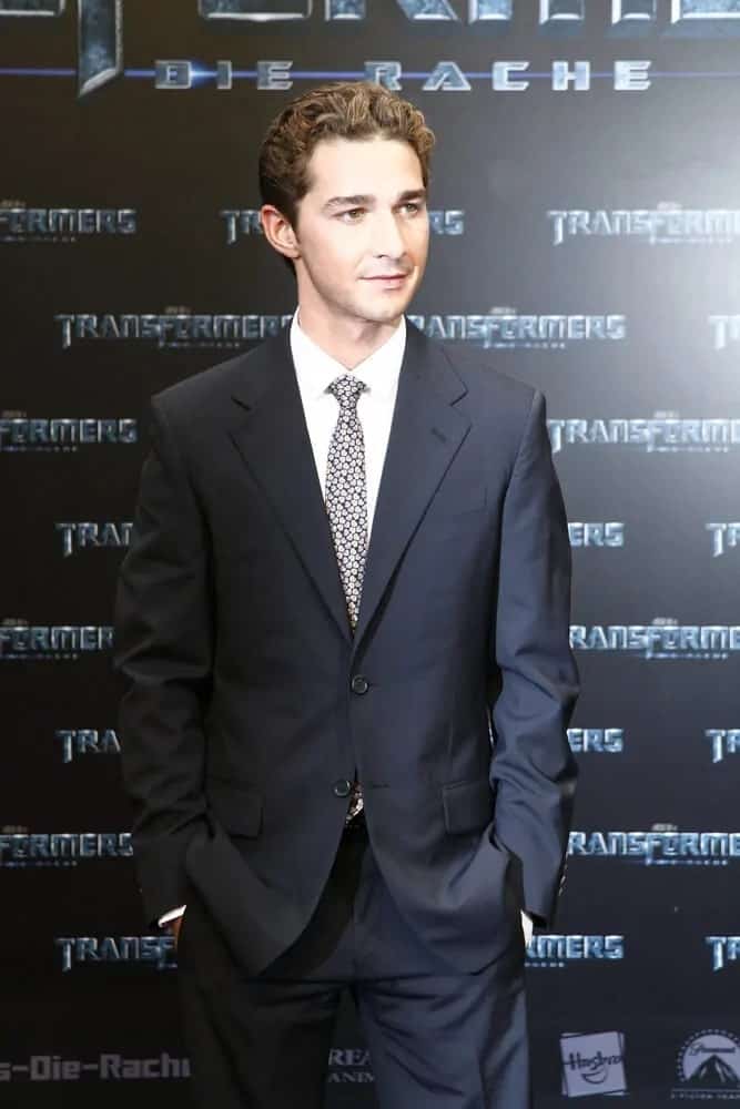 Mr. LaBeouf made an appearance at the German premiere of 'Transformers: Revenge Of The Fallen' last June 14, 2009 with his thick highlighted curls paired with a clean-shaved, fresh face.