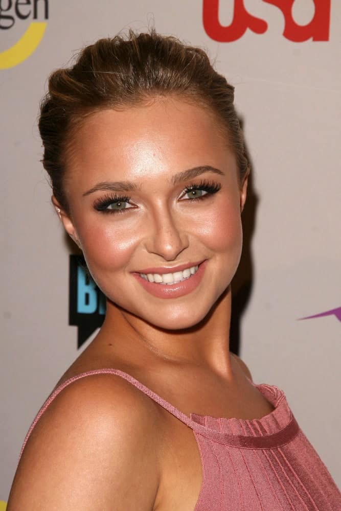 The model shines in a pink halter dress with her hair backcombed on a neat bun. She finishes the look with a peachy makeup that was worn during the NBC Universal 2008 Press Tour All Star Party held on July 20, 2008.