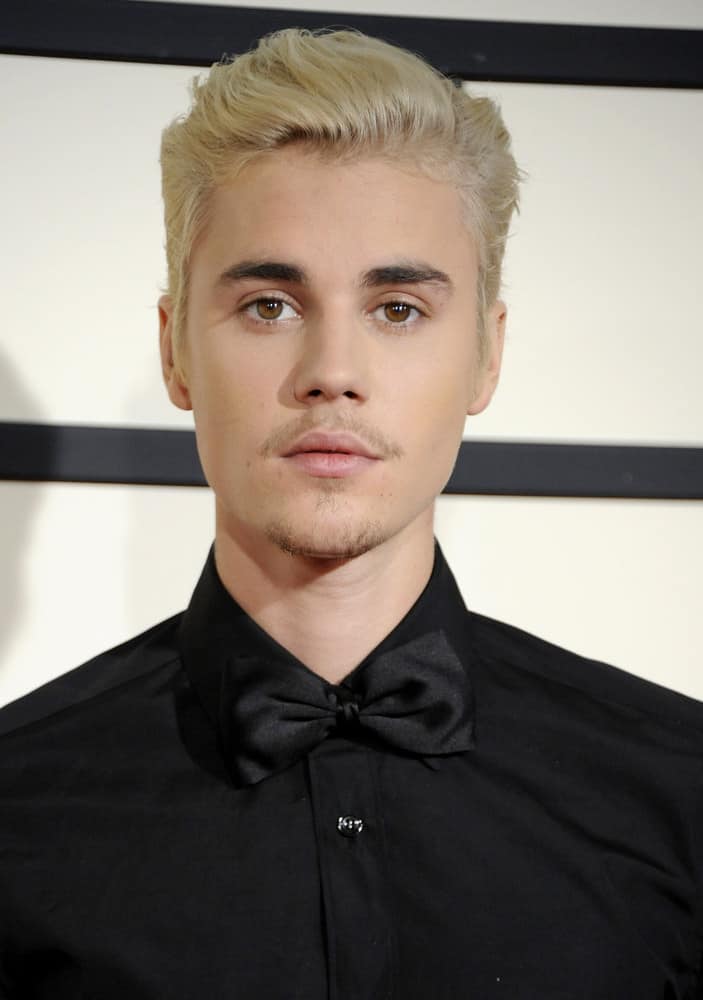 Justin Bieber dyed his hair platinum blonde and had it combed back for the 58th GRAMMY Awards held at the Staples Center in Los Angeles, USA on February 15, 2016.