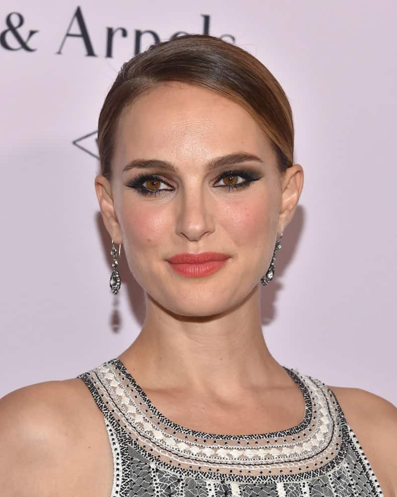 Natalie Portman attended the LA Dance Project Gala on October 19, 2019 in Los Angeles, CA. She wore a stylish and fashionable dress that she paired with an elegant and slick side-parted hairstyle with highlights.