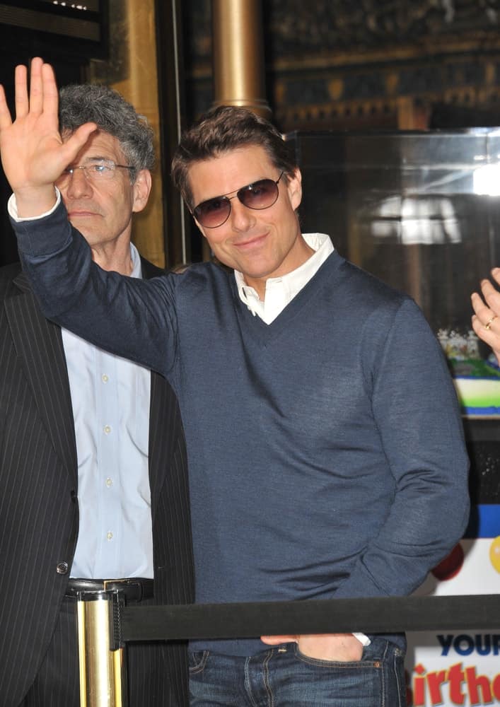 Tom Cruise was on Hollywood Boulevard where Jerry Bruckheimer was honored with the 2,501st star on the Hollywood Walk of Fame back in June 24, 2013 in Los Angeles. He came in casual sweater and jeans that went well with his short tousled hair with highlights.