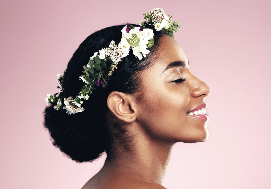 black woman with boho bun hairstyle