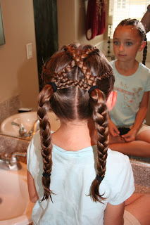 Back view of girl's hair styled in "Criss-Cross French Braids"