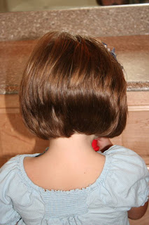 Back view of young girl with  A-Line Bob Haircut