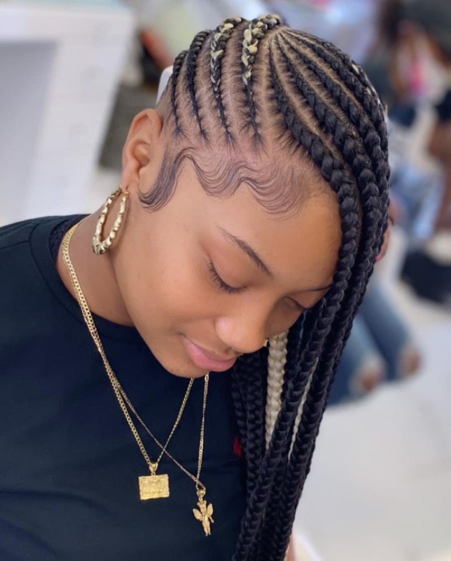 black girl with side swept feed braids