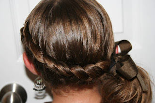 Back view of young girl modeling "Wrap-Around French Braid" hairstyle