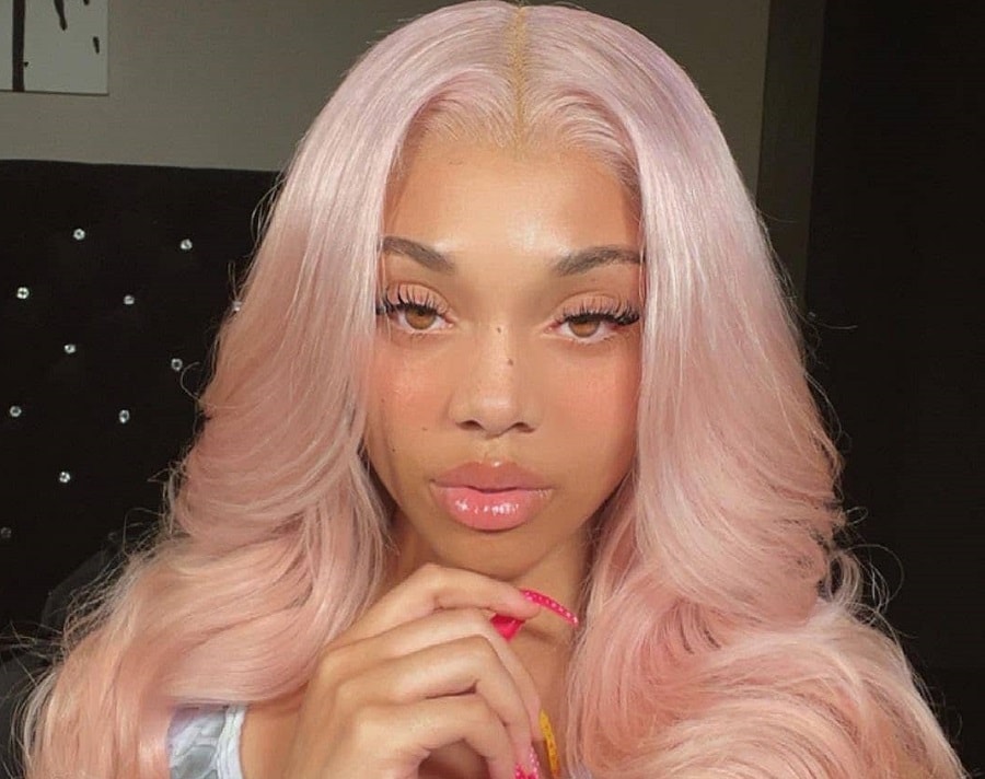 wavy light pink sew in hair