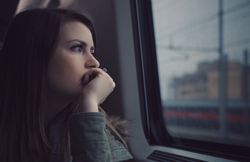 Sad Girl Looking Out Window