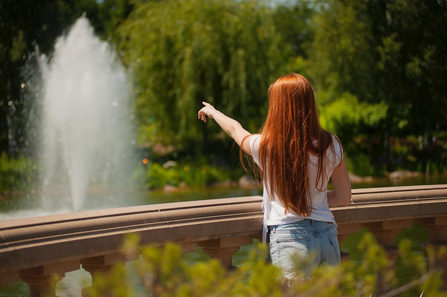 red-haired-woman-in-park