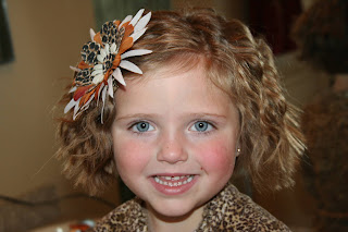 Portrait of young girl modeling 3-barrel curl hairstyle on her a-line bob